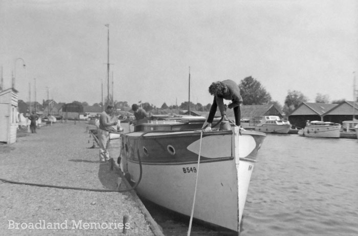 Wroxham, alongside Ernest Collins boatyard 1960s